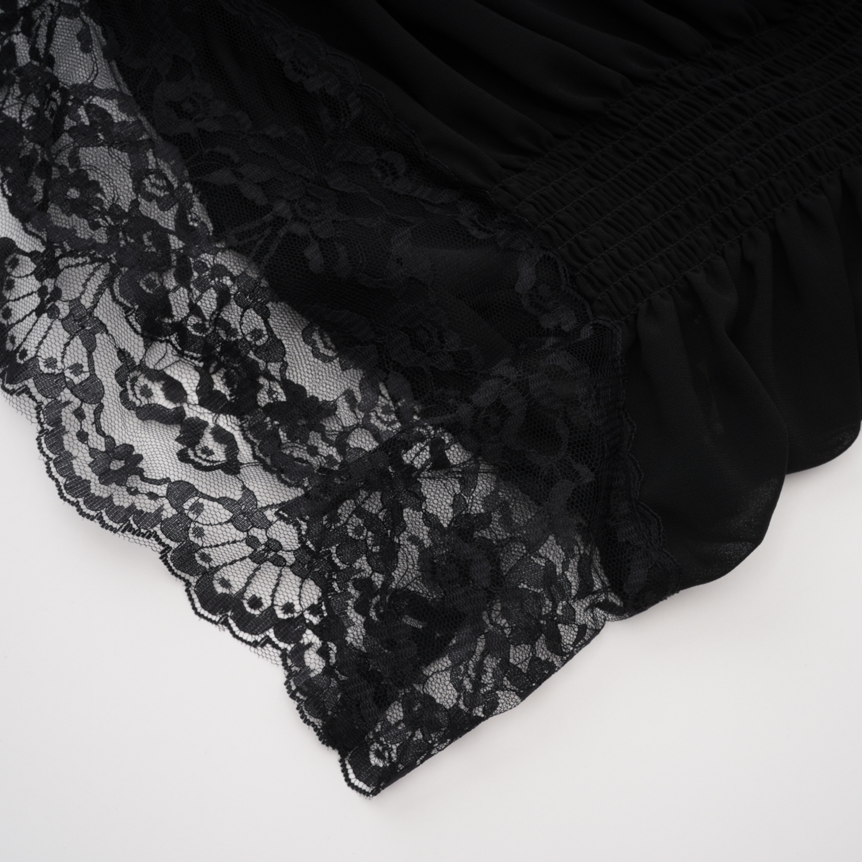 Avis Black Ruched Mini Dress with Lace Trim