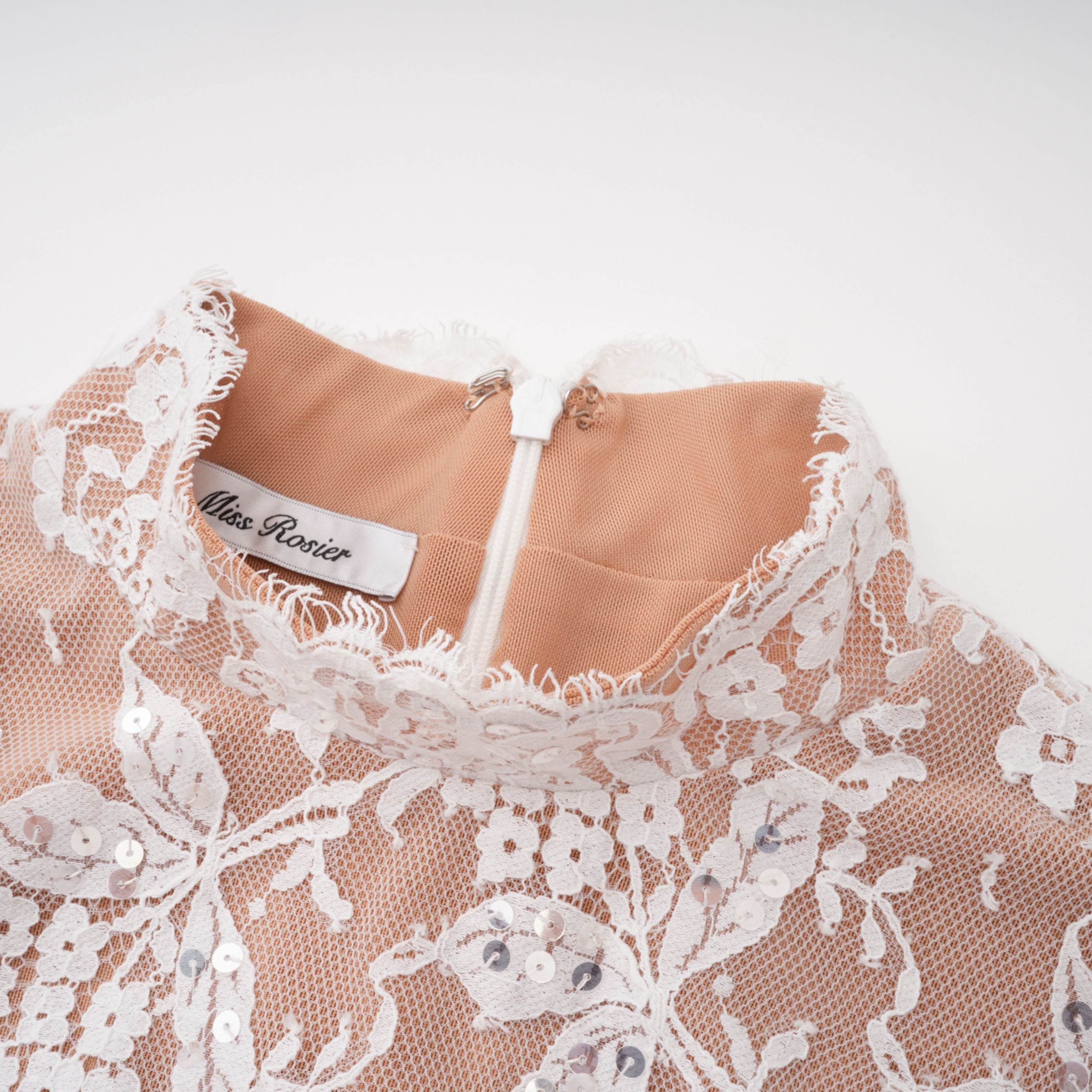 White lace corset-style mini dress with bell sleeves