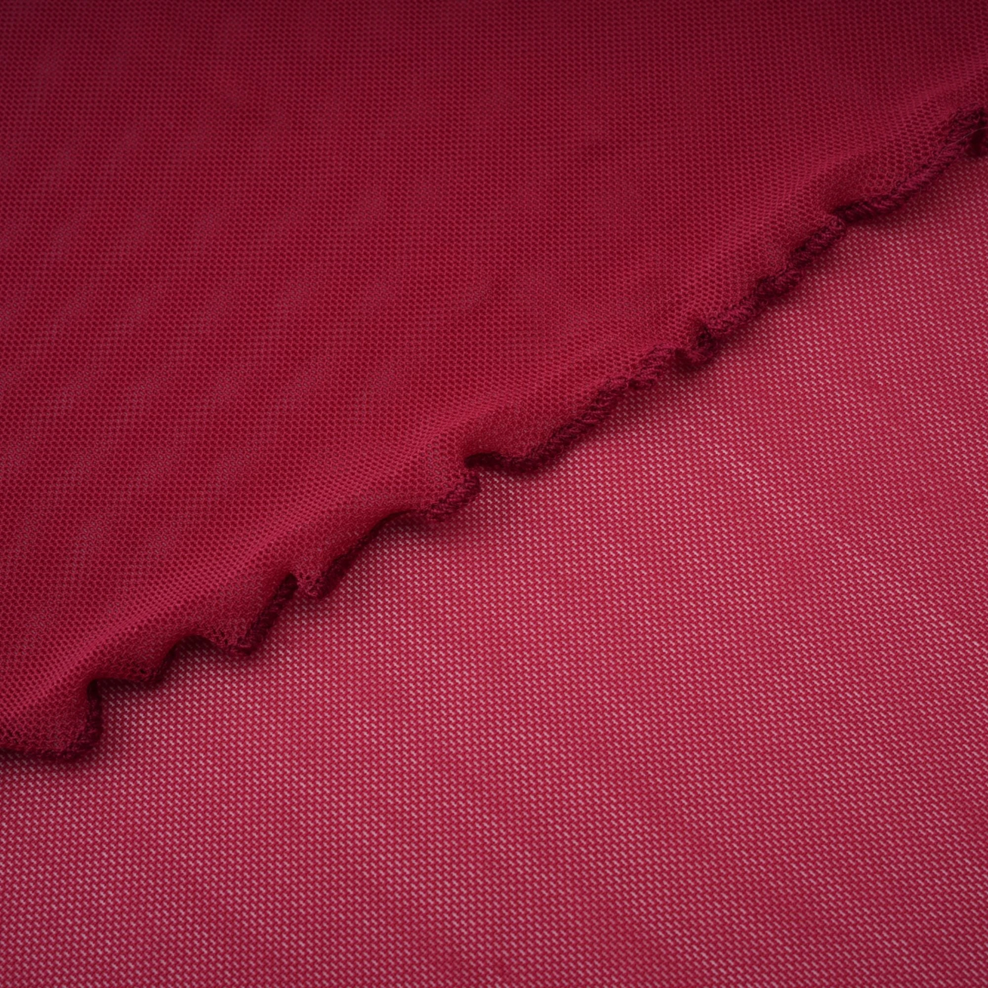 Burgundy ruched gown with a draped high neckline and sheer skirt