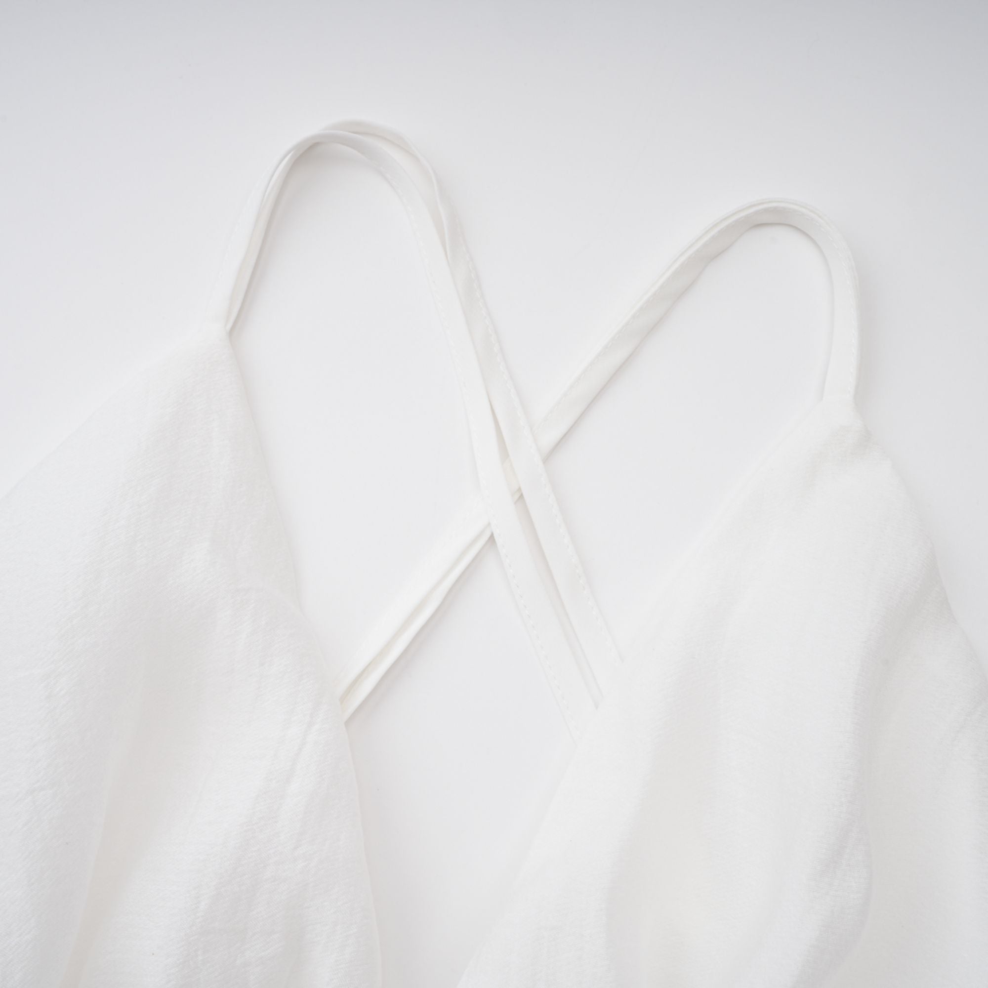 Quincie white shirred flounced mini dress