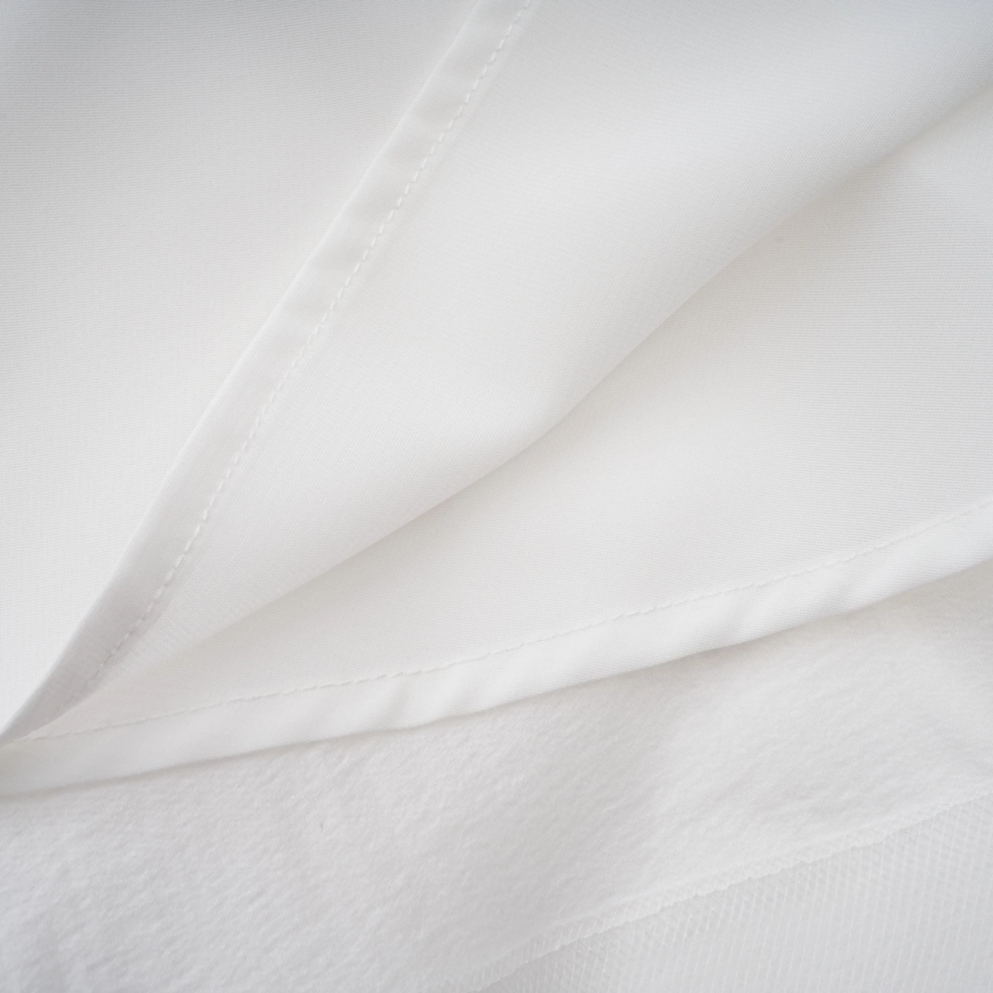 Quincie white shirred flounced mini dress