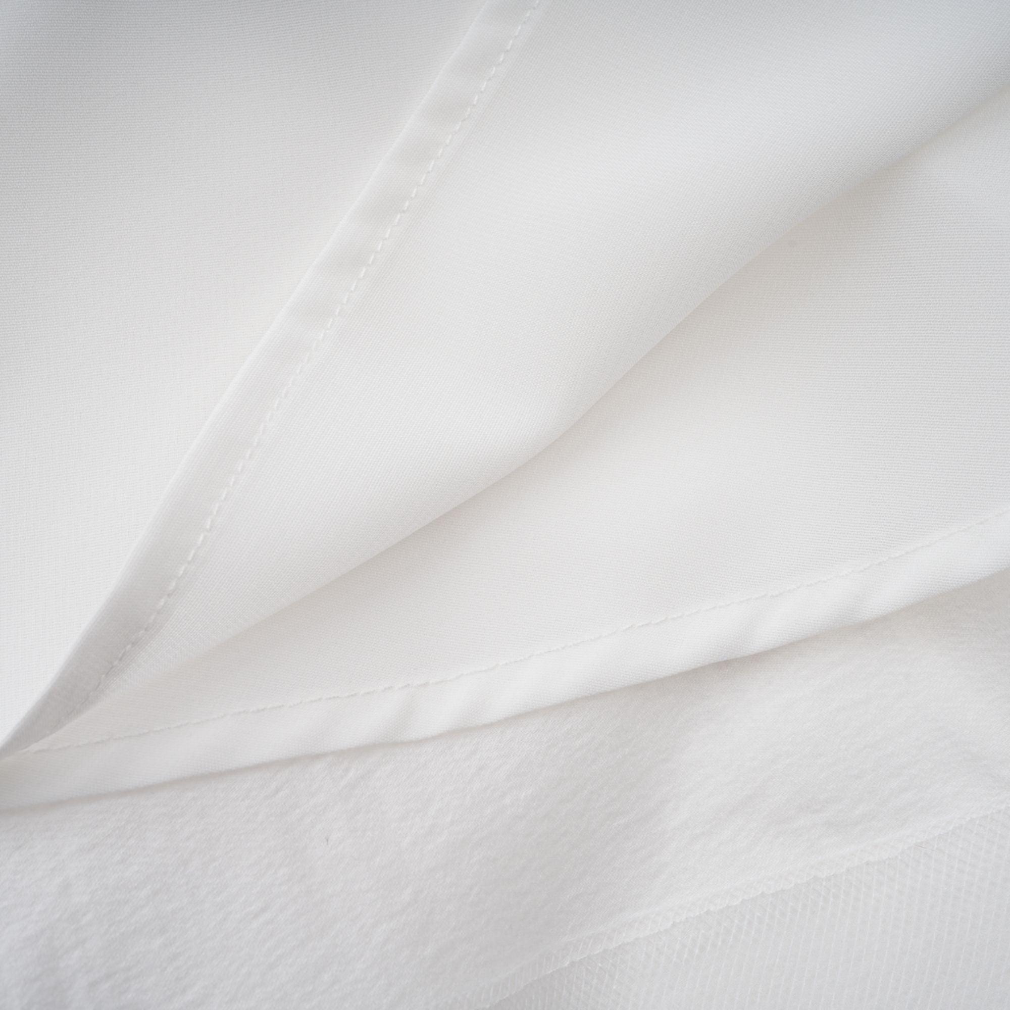 Quincie white shirred flounced mini dress
