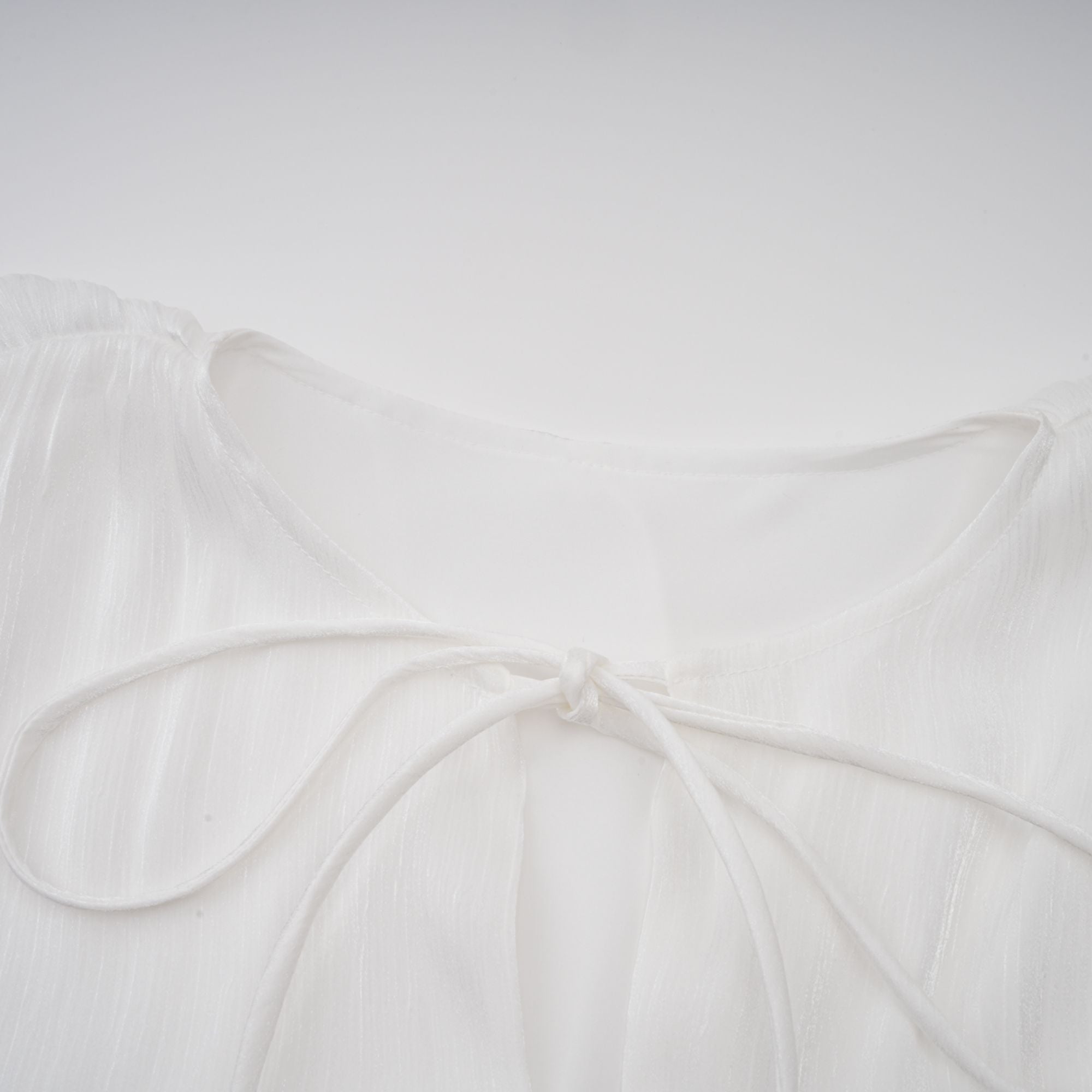 Mahault White Pleated Glitter-Effect Mini Dress