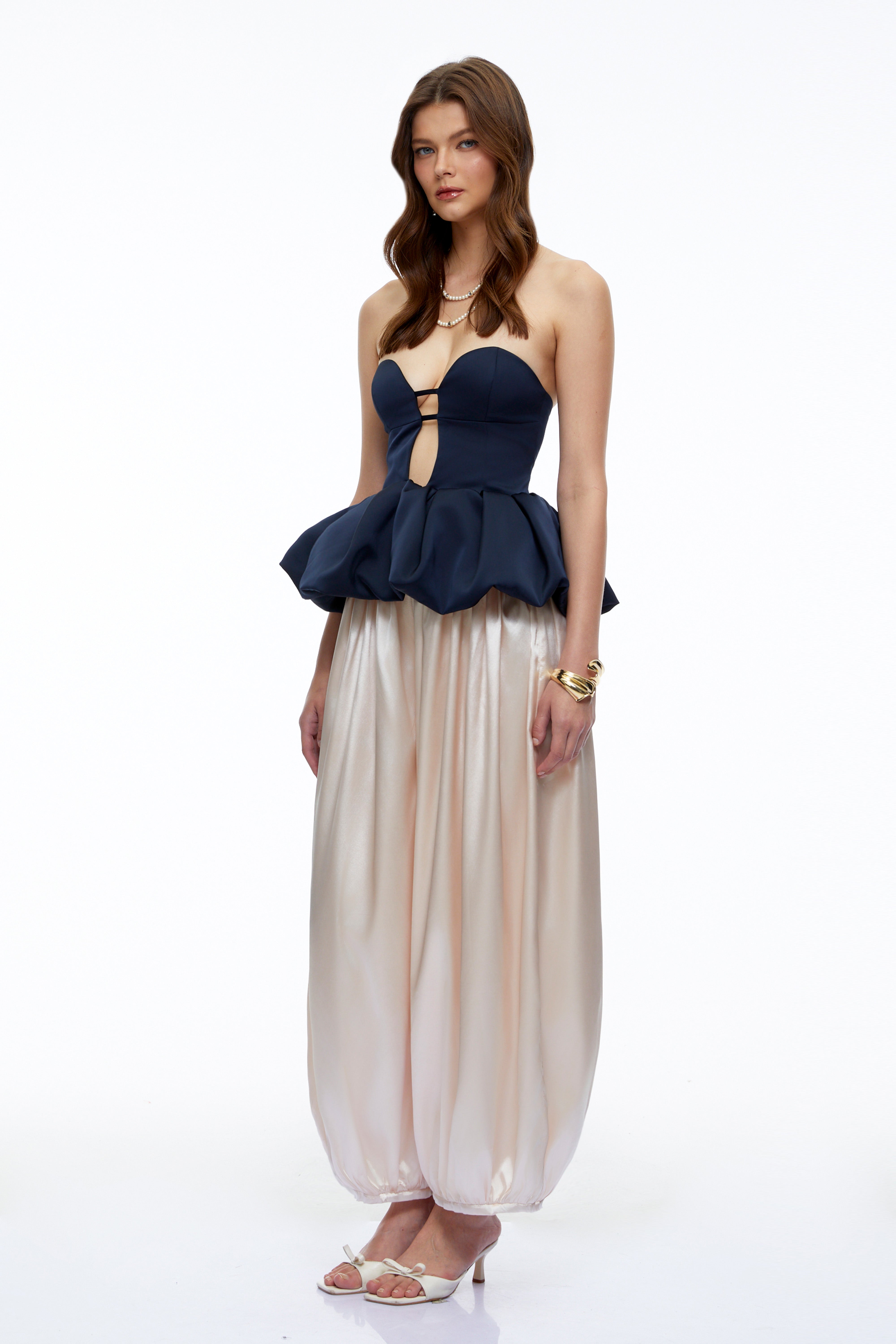 Navy strapless peplum bustier top and beige balloon trousers set